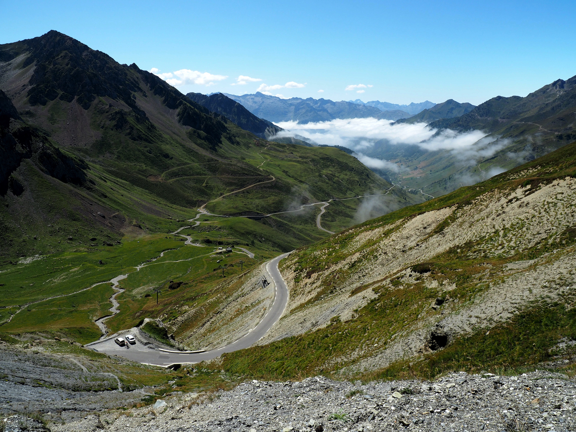Shot of montane landscapes with narrow roads in Col du Tourmalet in Bagnerese-de-Bigorre, France