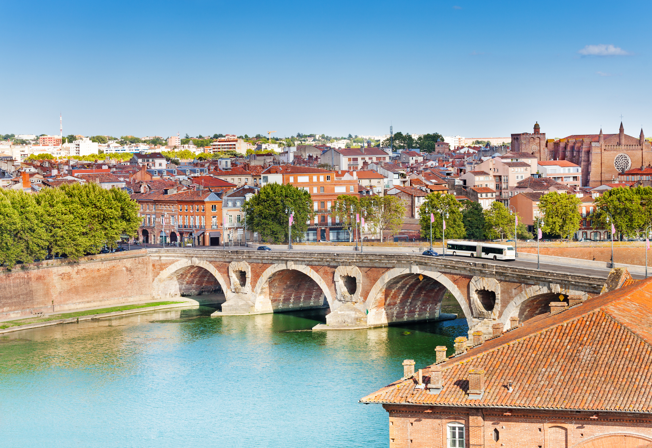 Toulouse and Pont Neuf bridge across Garonne river
